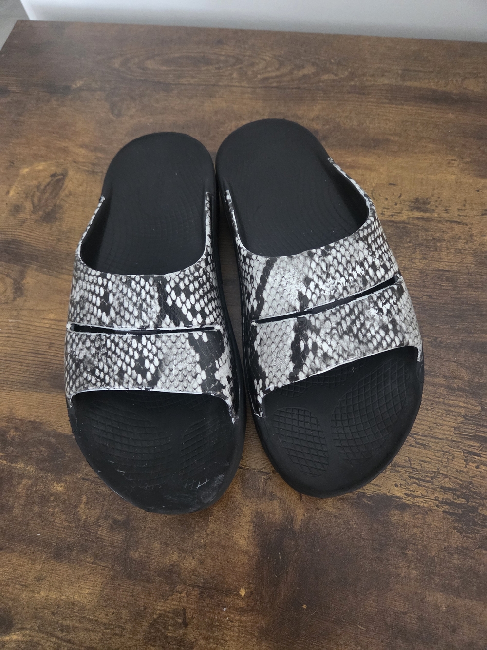 OOFOS Black and White Snake-Print Slide Sandals